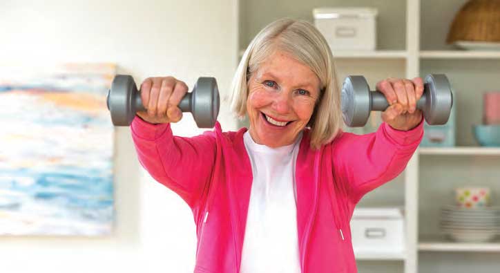 retired woman lifing weights