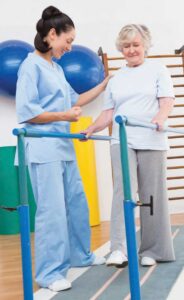 woman getting physical therapy with a nurse