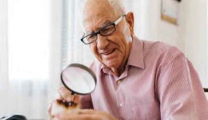 Man using a magnifying glass