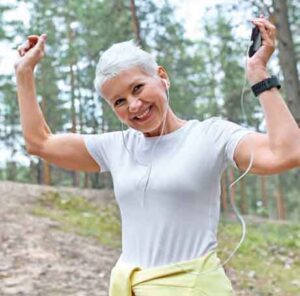 Woman listening to music while exercising