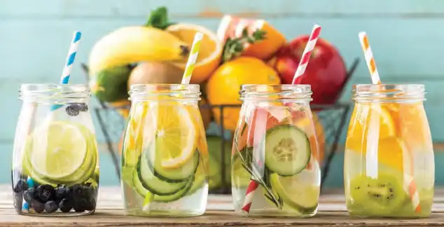 Mason jars with water and fruit