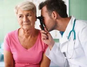 woman getting a checkup from her doctor