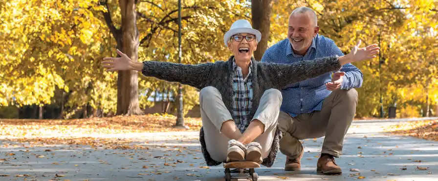 Couple having fun on a skateboard