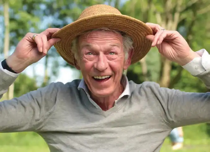 Man smiling in a hat