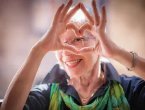 Woman making a heart with her hands