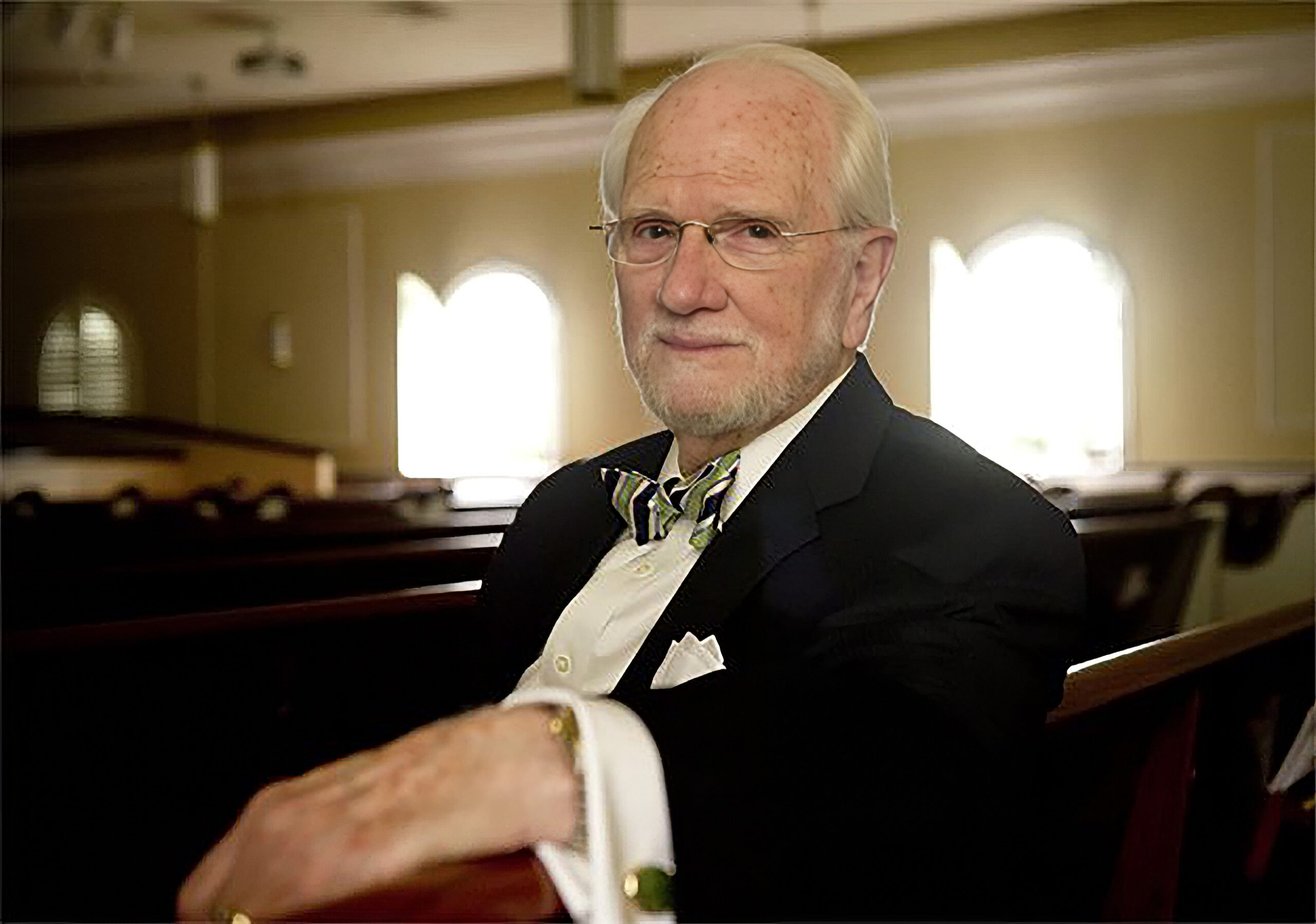 man in suit with bow tie
