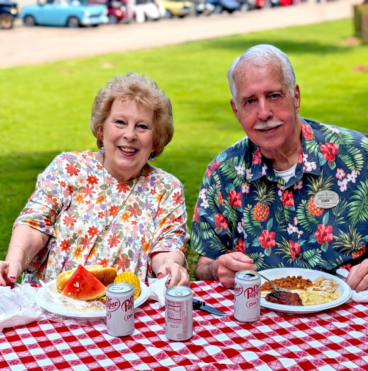 man and woman at picnic table